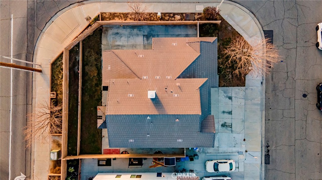 4660 Spice Street Lancaster, CA 93536 - Photo 6 of 42 an aerial view of a house with a swimming pool