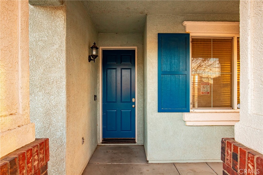 4660 Spice Street Lancaster, CA 93536 - Photo 8 of 42 a view of front door of house