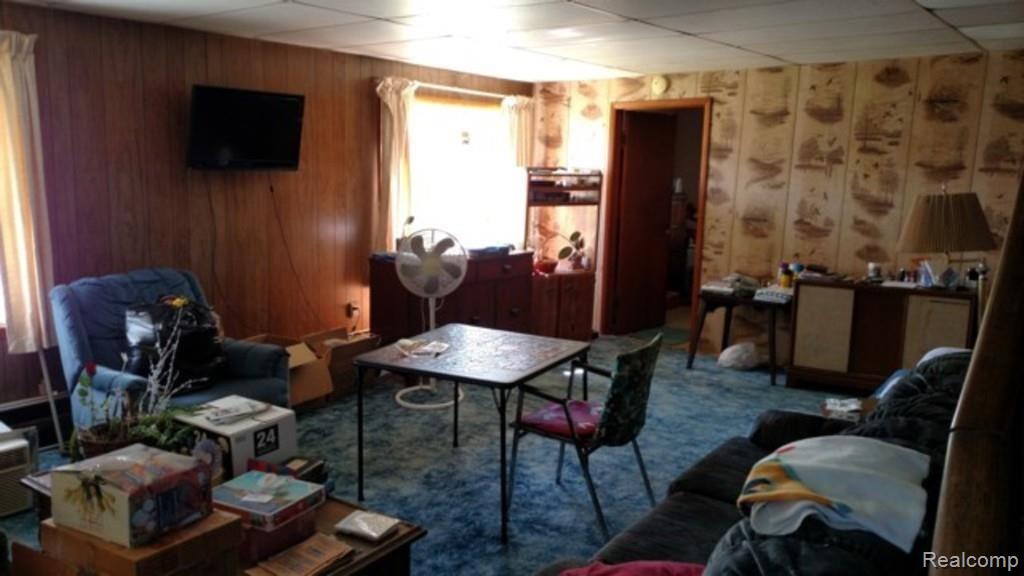 9183 Metcalf Road Avoca, MI 48006 - Photo 5 of 18 This is a partial view of the living room.
