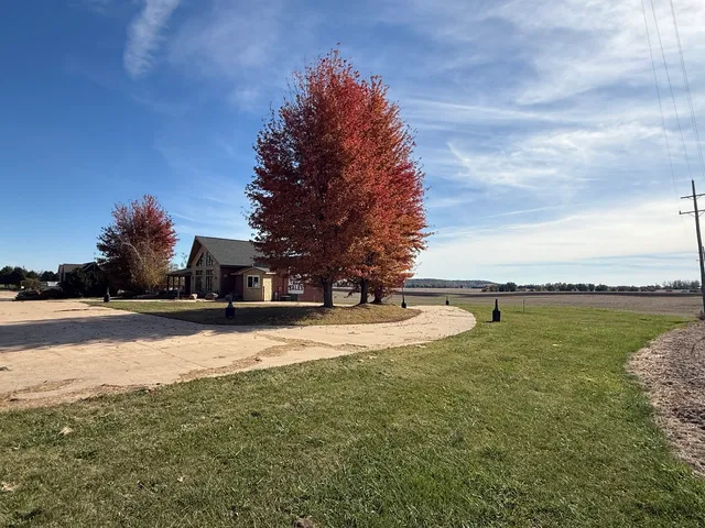 a view of a house with a big yard
