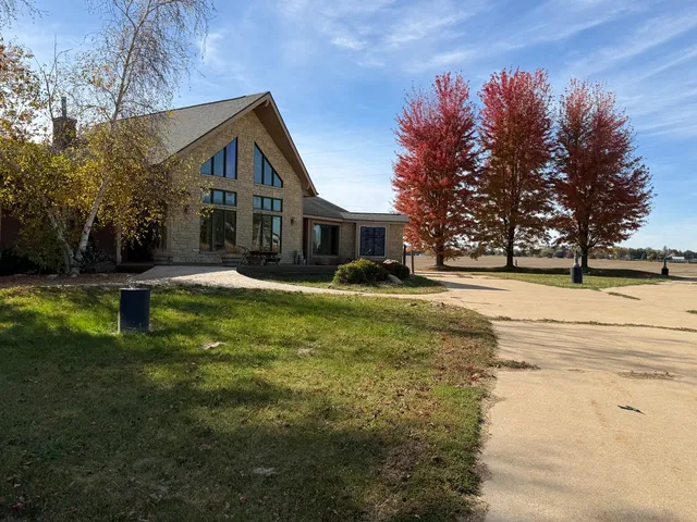 a view of a yard in front of a house