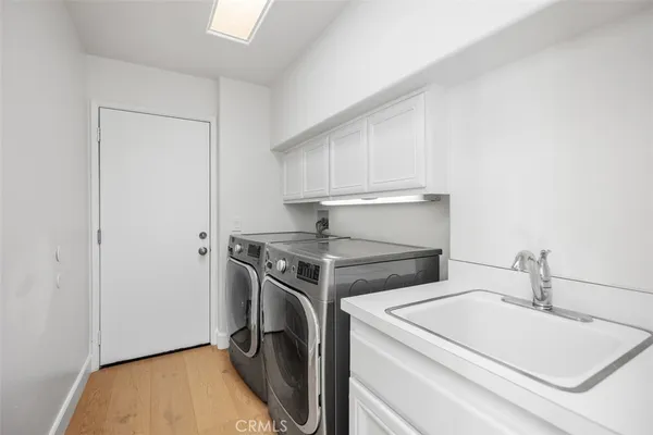 a kitchen with a stove and a sink