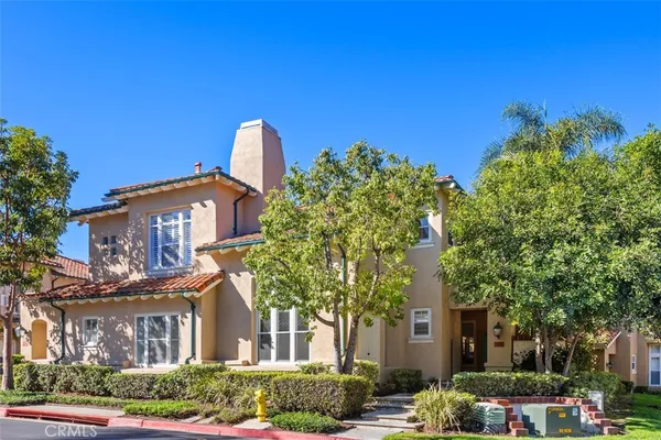 a front view of a building with garden