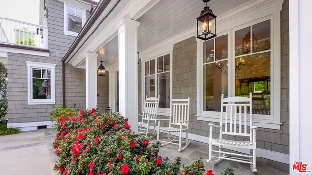 a flower plants in front of a house