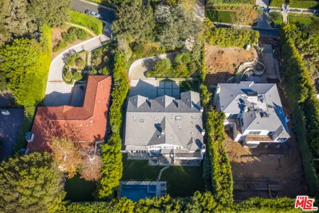 a view of a house with a yard porch and furniture