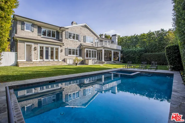 a view of a hallway view with wooden floor and furniture