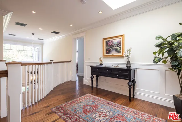 a bathroom with a shower sink and mirror