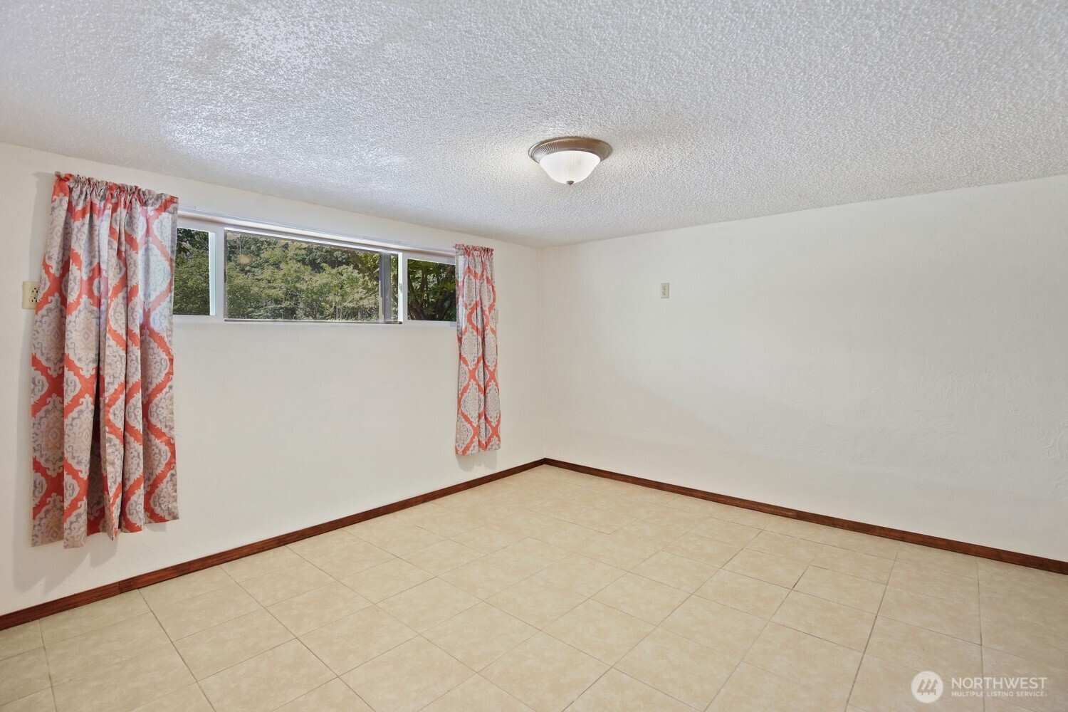 2670 Southeast Bielmeier Road Port Orchard, WA 98367 - Photo 23 of 39 a view of a room with a large window