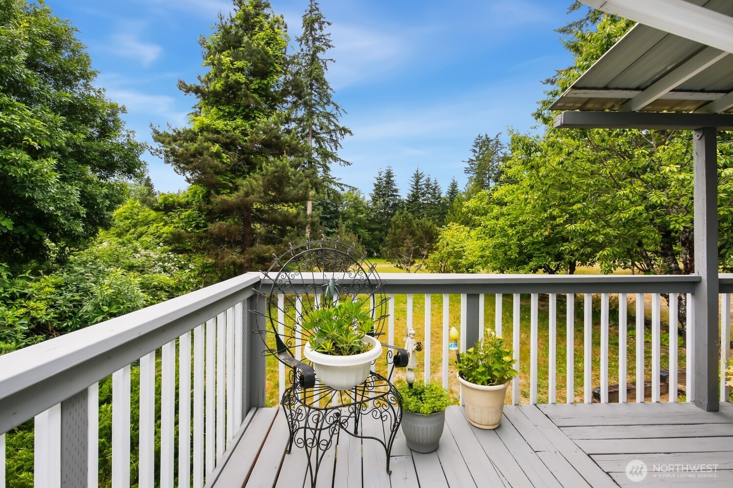 2670 Southeast Bielmeier Road Port Orchard, WA 98367 - Photo 27 of 39 a view of a balcony with wooden floor and fence