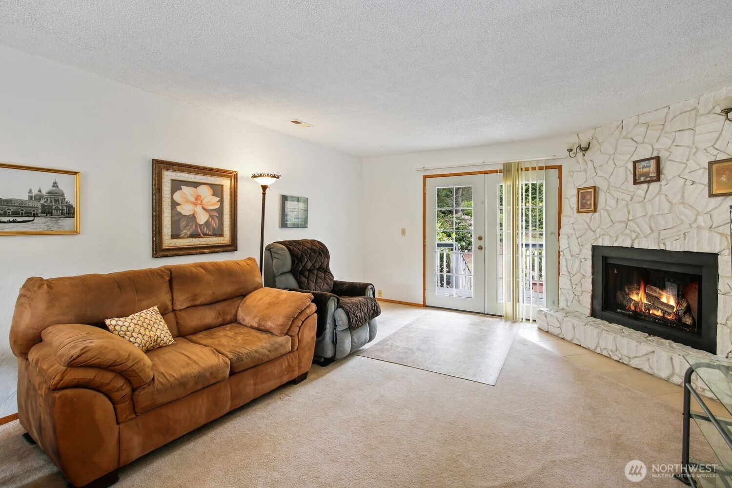 2670 Southeast Bielmeier Road Port Orchard, WA 98367 - Photo 4 of 39 a living room with furniture and a fireplace