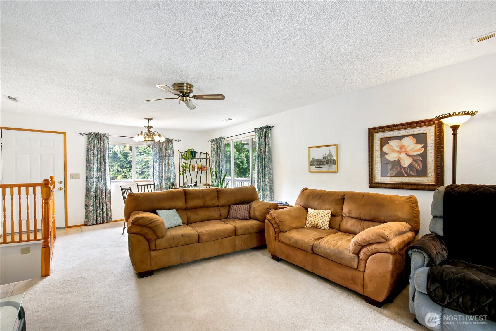 2670 Southeast Bielmeier Road Port Orchard, WA 98367 - Photo 5 of 39 a living room with furniture and a large window with wooden floor