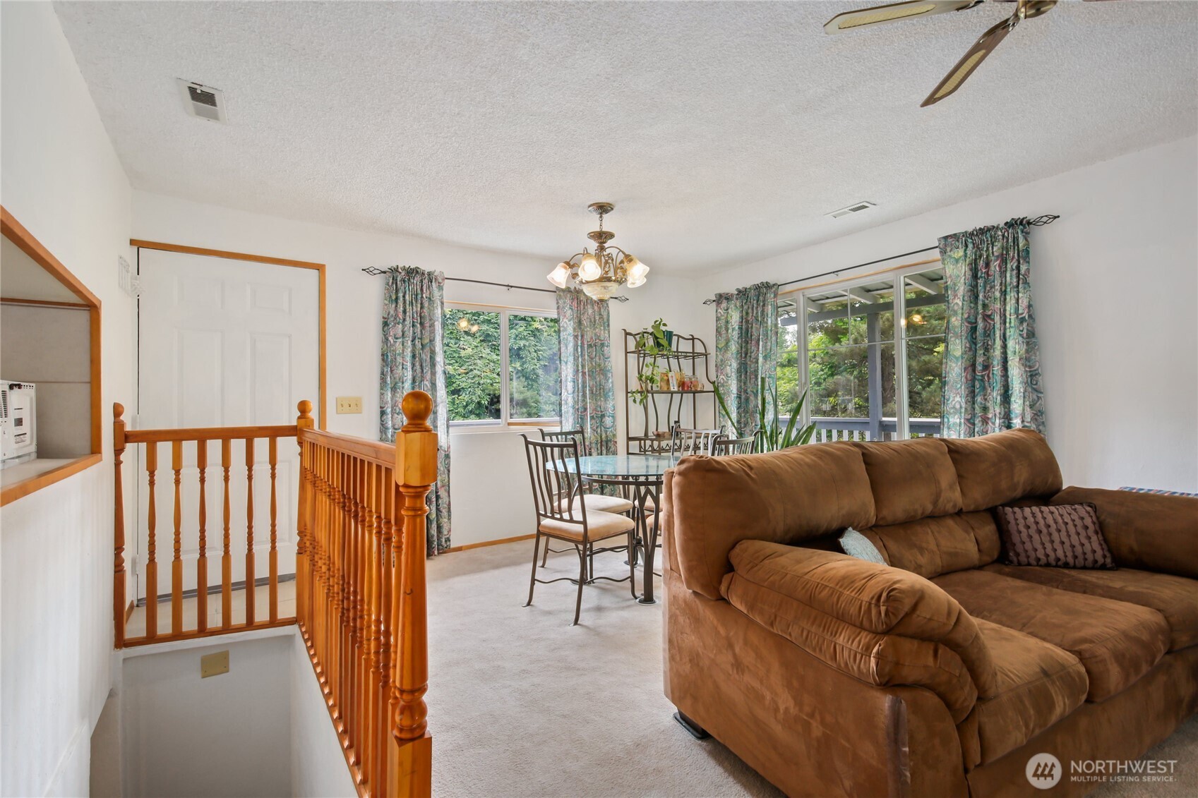 2670 Southeast Bielmeier Road Port Orchard, WA 98367 - Photo 6 of 39 a living room with furniture and a large window
