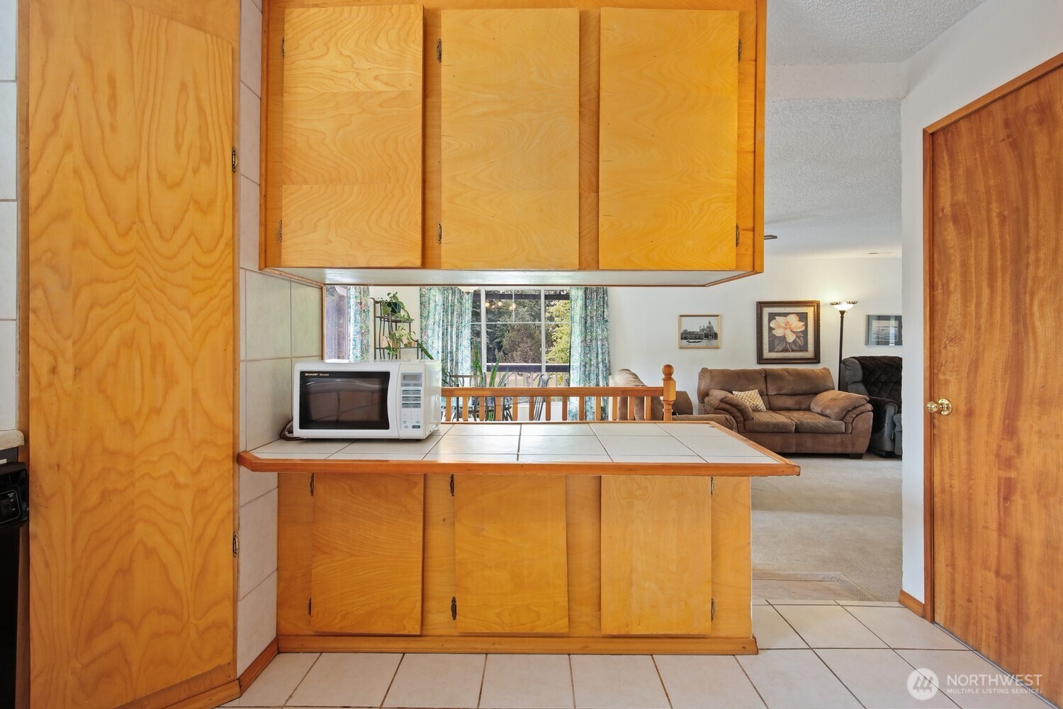 2670 Southeast Bielmeier Road Port Orchard, WA 98367 - Photo 8 of 39 a view of living room with a table and chairs