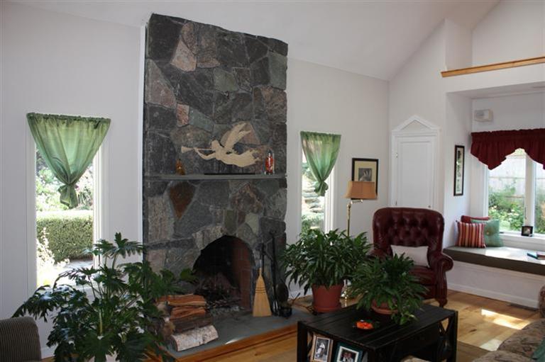 279 Cove Road Wellfleet, MA 02667 - Photo 11 of 28 a living room with furniture and a potted plant