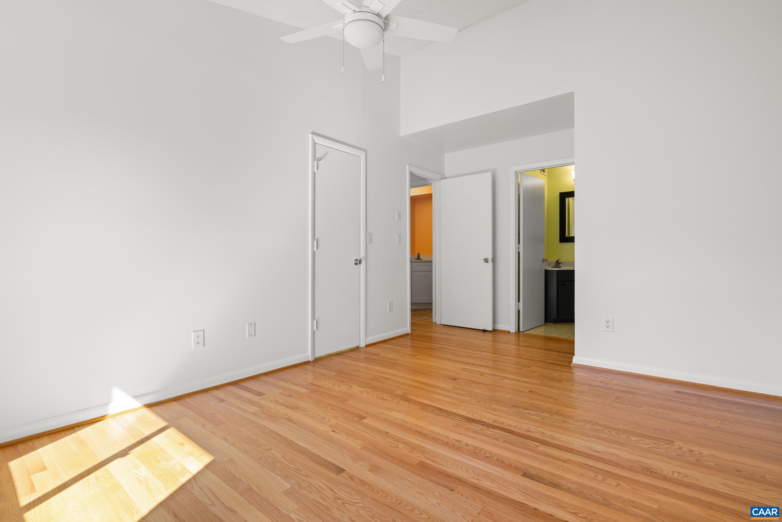 127 Turtle Creek Road, Unit 12 Charlottesville, VA 22901 - Photo 14 of 33 a view of empty room with wooden floor
