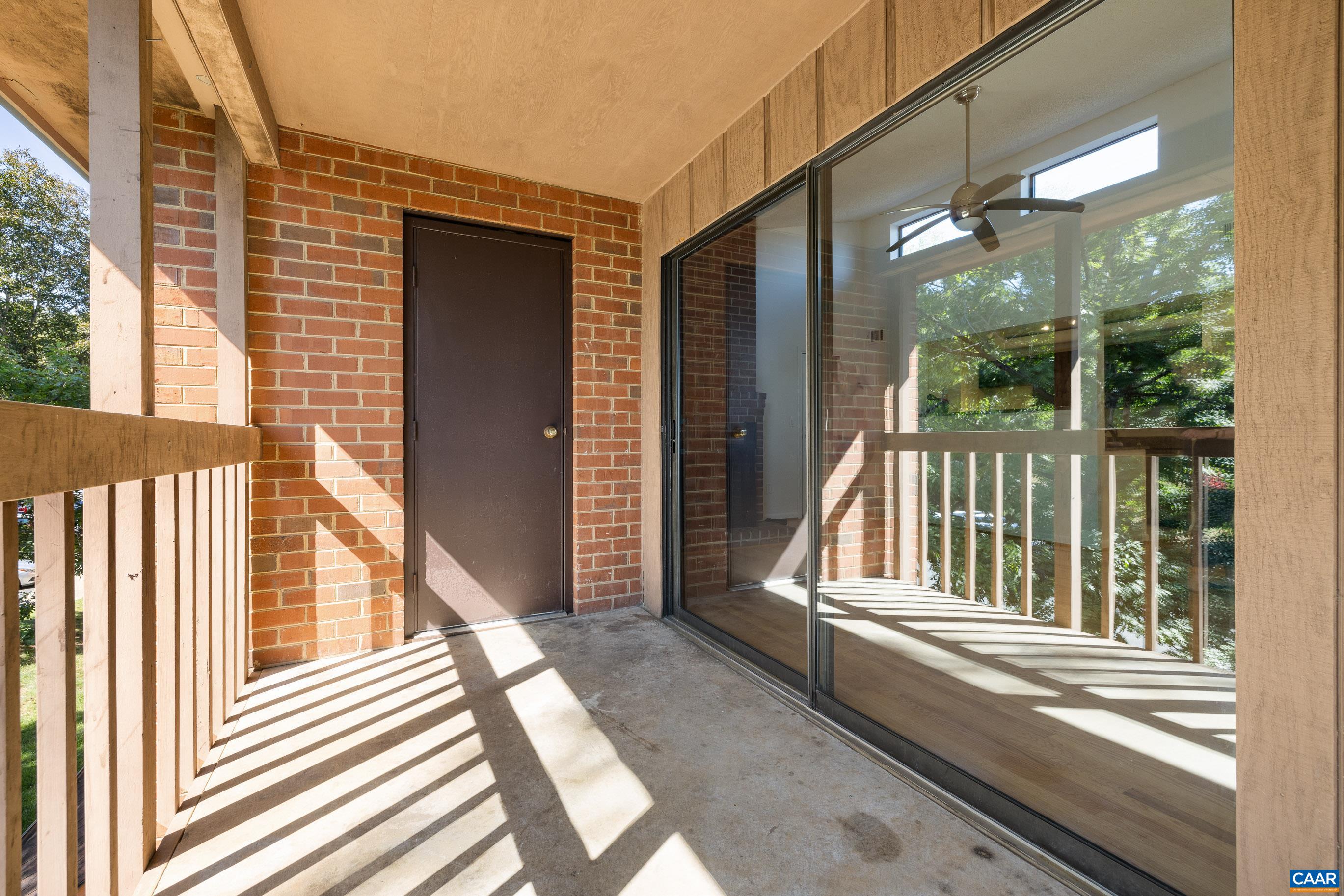 127 Turtle Creek Road, Unit 12 Charlottesville, VA 22901 - Photo 24 of 33 a view of a balcony with a potted plants