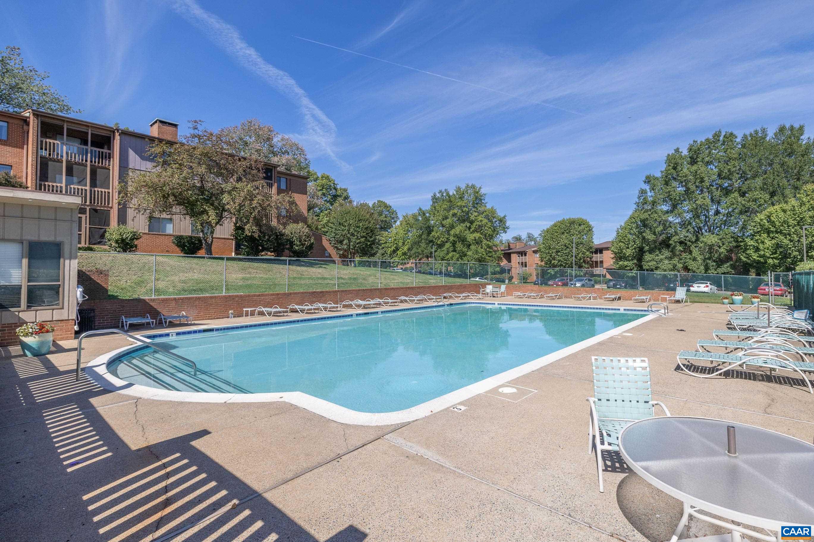 127 Turtle Creek Road, Unit 12 Charlottesville, VA 22901 - Photo 28 of 33 a view of a swimming pool with a patio