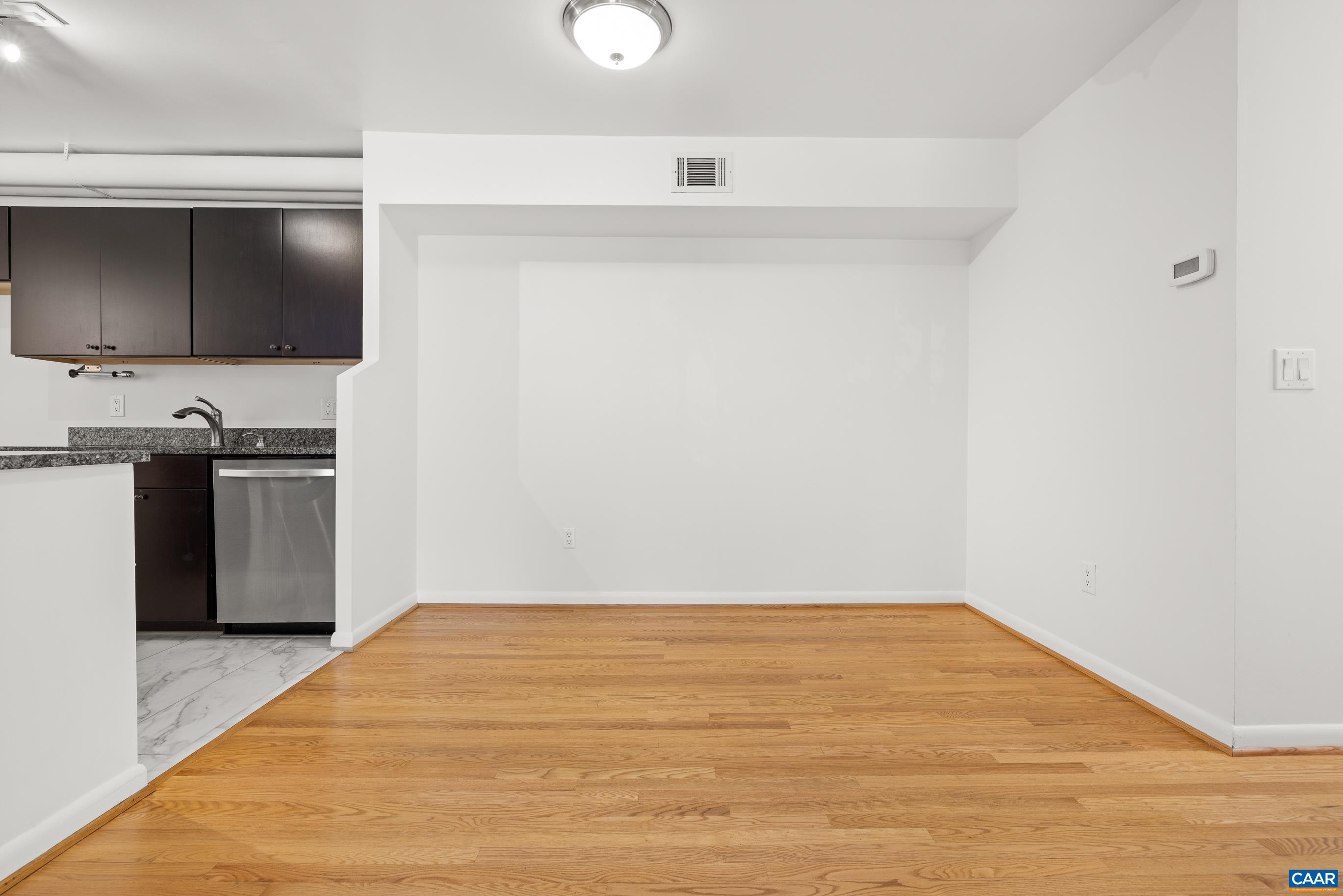 127 Turtle Creek Road, Unit 12 Charlottesville, VA 22901 - Photo 8 of 33 a view of a kitchen from the hallway