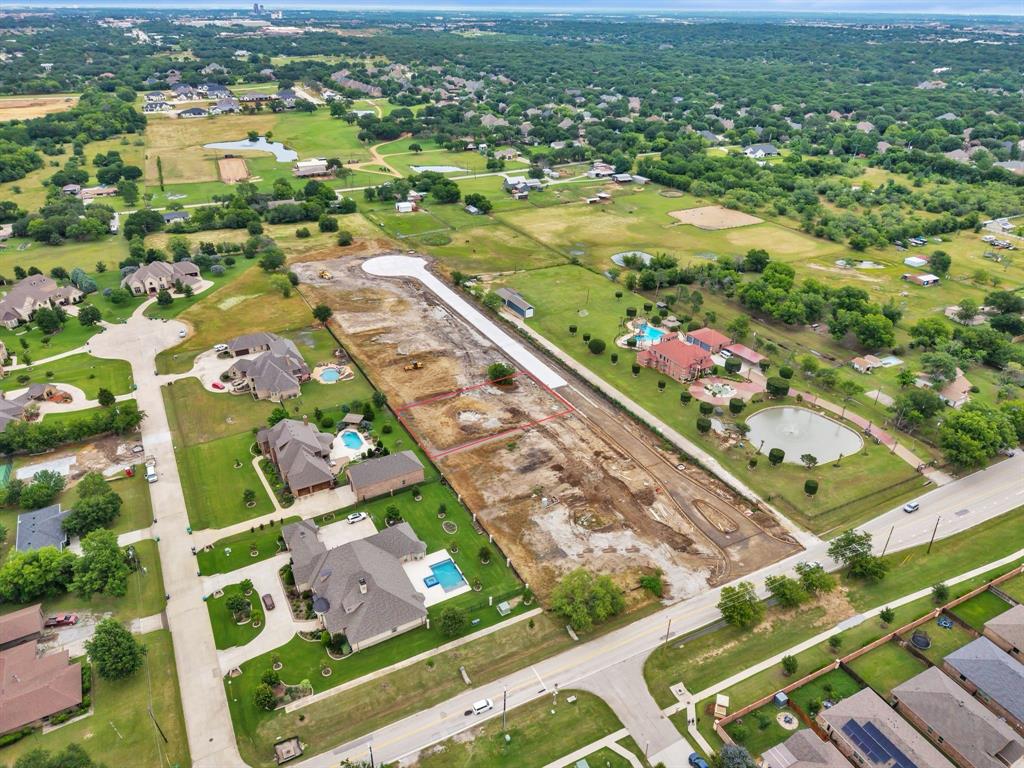 3904 Conservation Court Denton, TX 76210 - Photo 11 of 12 an aerial view of residential houses with outdoor space
