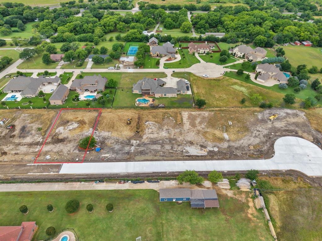 3904 Conservation Court Denton, TX 76210 - Photo 5 of 12 an aerial view of a residential houses with outdoor space