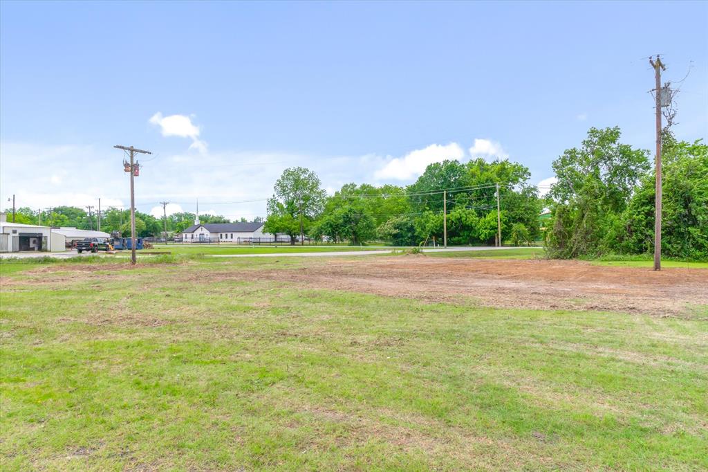 1008 South Virginia Street Terrell, TX 75160 - Photo 19 of 22 a view of a green field