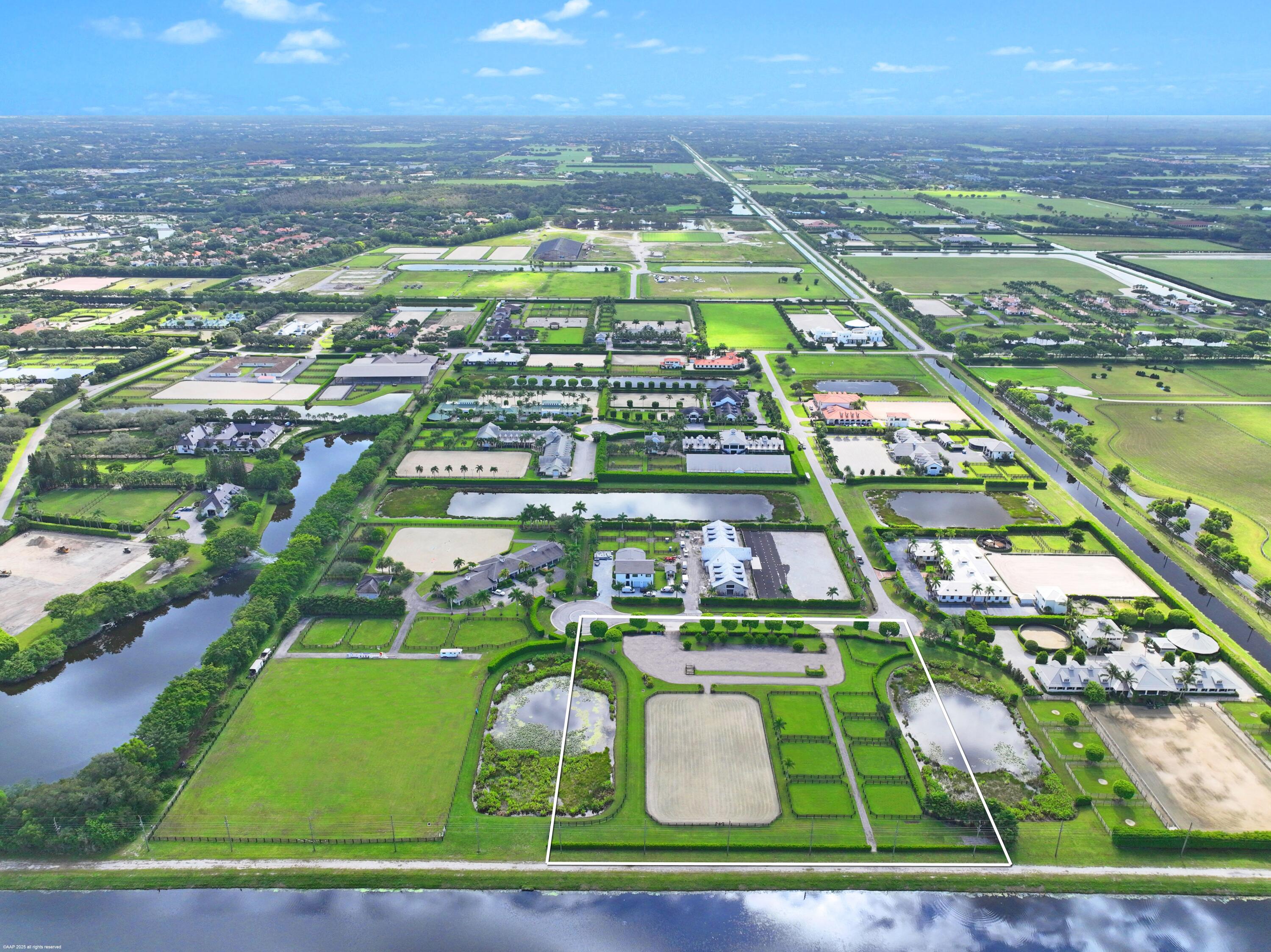 3899 Shutterfly Way Wellington, FL 33414 - Photo 18 of 27 an aerial view of a city