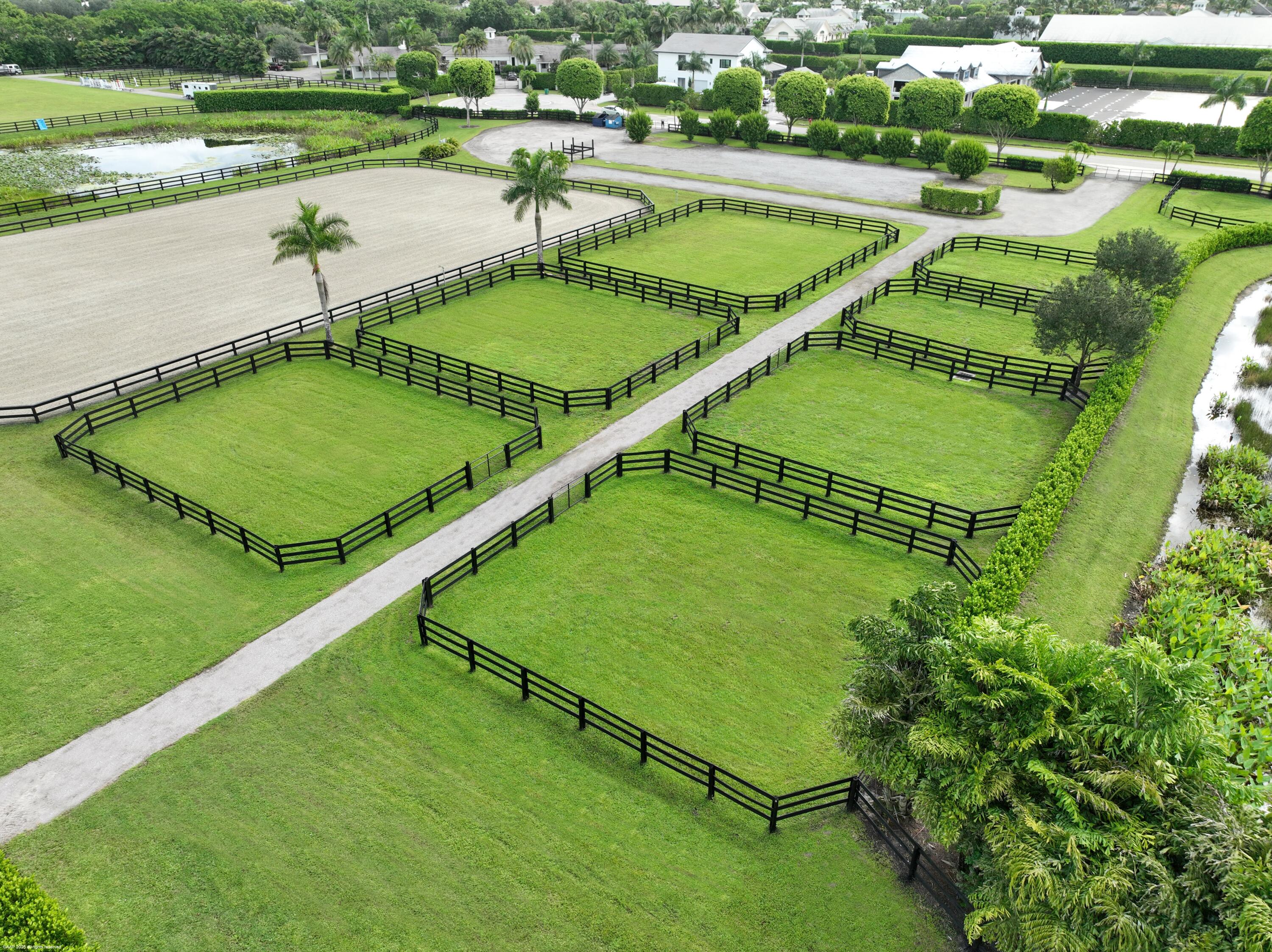 3899 Shutterfly Way Wellington, FL 33414 - Photo 3 of 27 an aerial view of a football ground