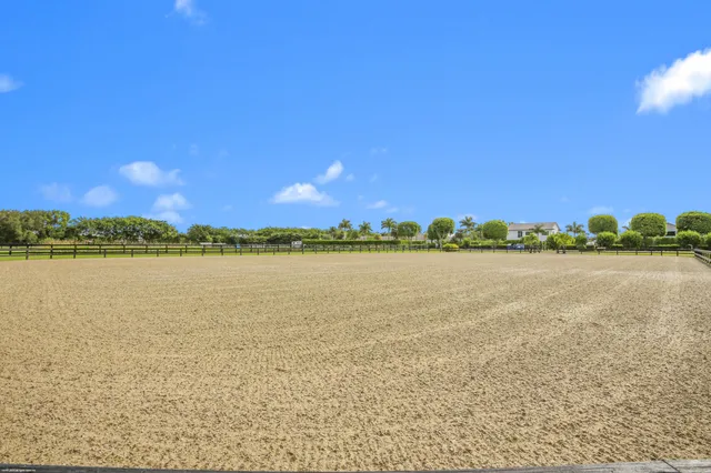 a bathroom with a sink and a painting on the wall