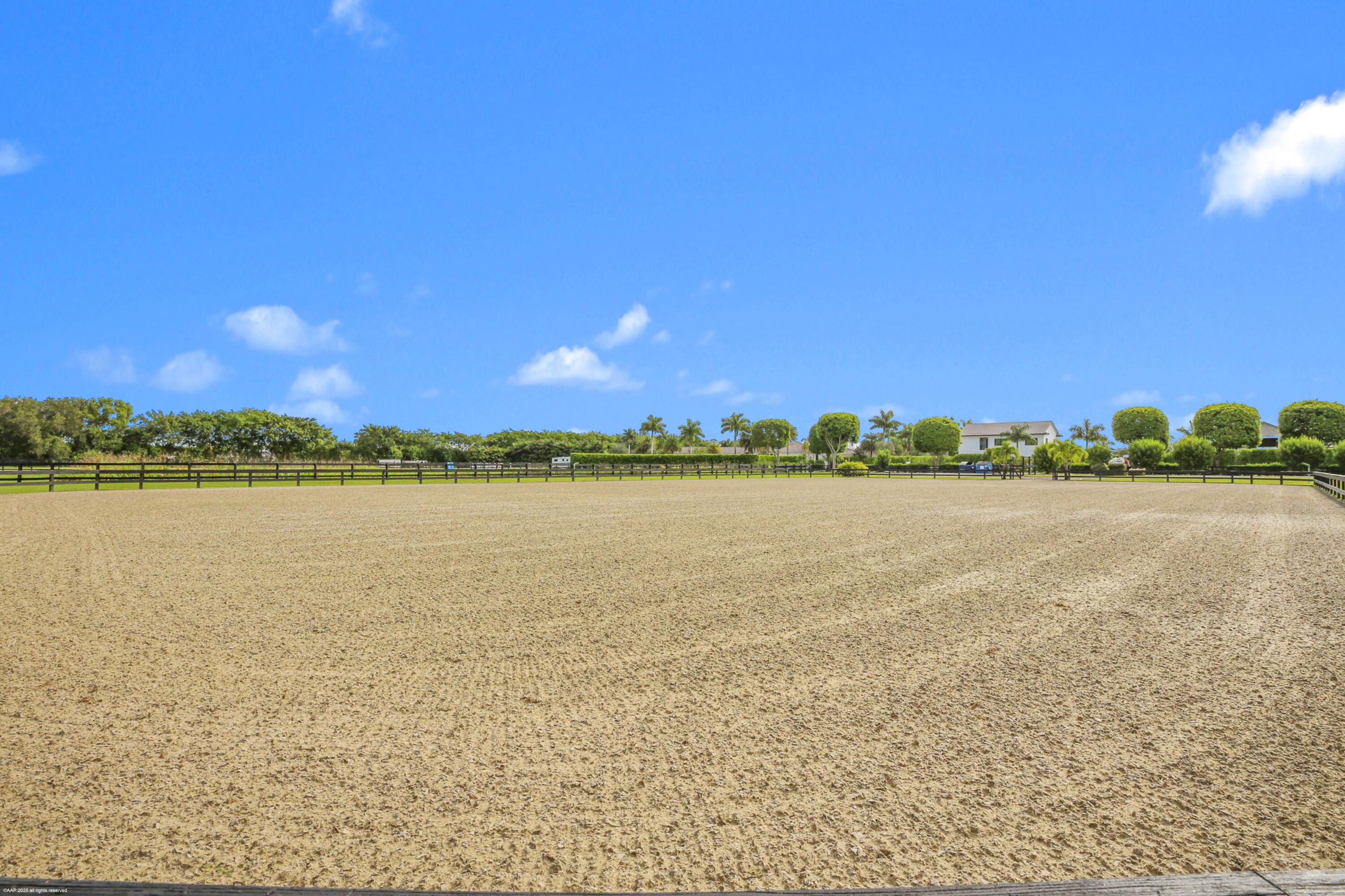 3899 Shutterfly Way Wellington, FL 33414 - Photo 9 of 27 a view of an ocean with city view