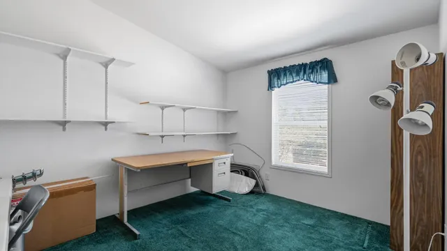 a room with cabinets and a wooden floor