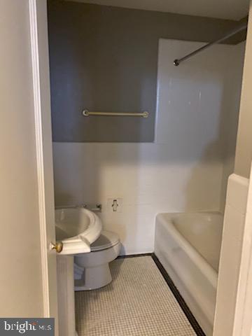 2031 Locust Street, Unit 405 Philadelphia, PA 19103 - Photo 5 of 13 a bathroom with a sink and a toilet