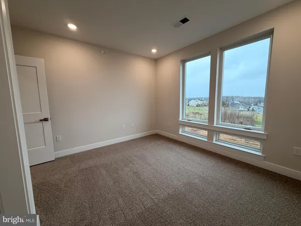 a bathroom with a double vanity sink mirror double and shower