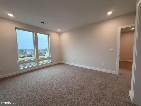 a black and white photo of a living room