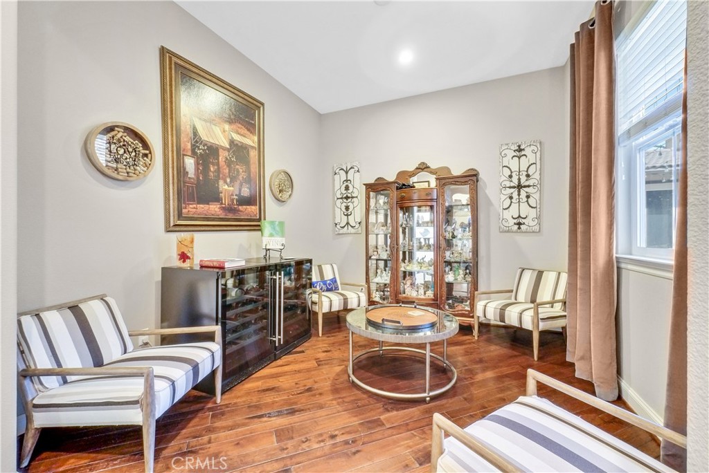 13123 Carriage Trail Court Rancho Cucamonga, CA 91739 - Photo 17 of 42 a room with furniture and a window