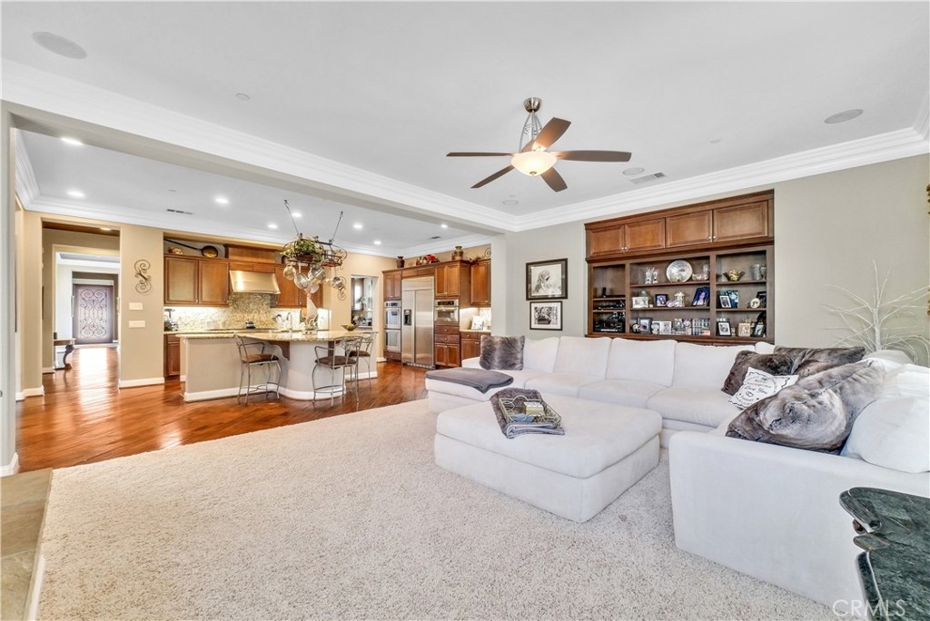 13123 Carriage Trail Court Rancho Cucamonga, CA 91739 - Photo 25 of 42 a living room with furniture and a large window