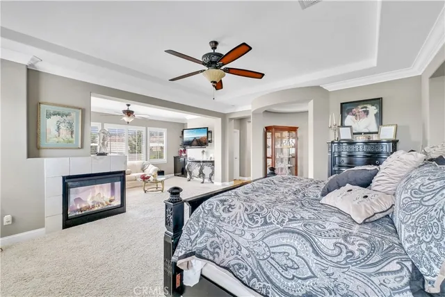 a large kitchen with stainless steel appliances granite countertop a sink and cabinets