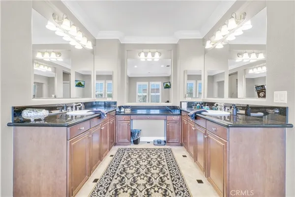 a bath tub sitting in a bathroom next to a window