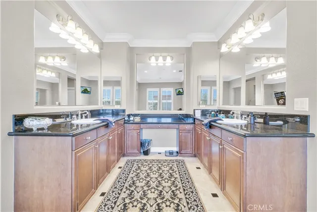 a bath tub sitting in a bathroom next to a window