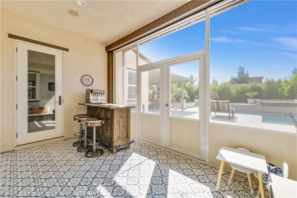 13123 Carriage Trail Court Rancho Cucamonga, CA 91739 - Photo 41 of 42 a view of a living room and dining room