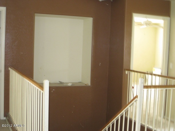 2849 East Bagdad Road San Tan Valley, AZ 85143 - Photo 16 of 17 a view of balcony with wooden floor