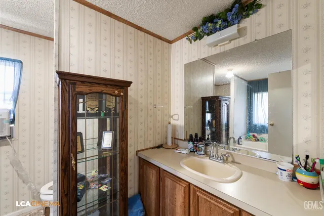 a bathroom with a tub and a window