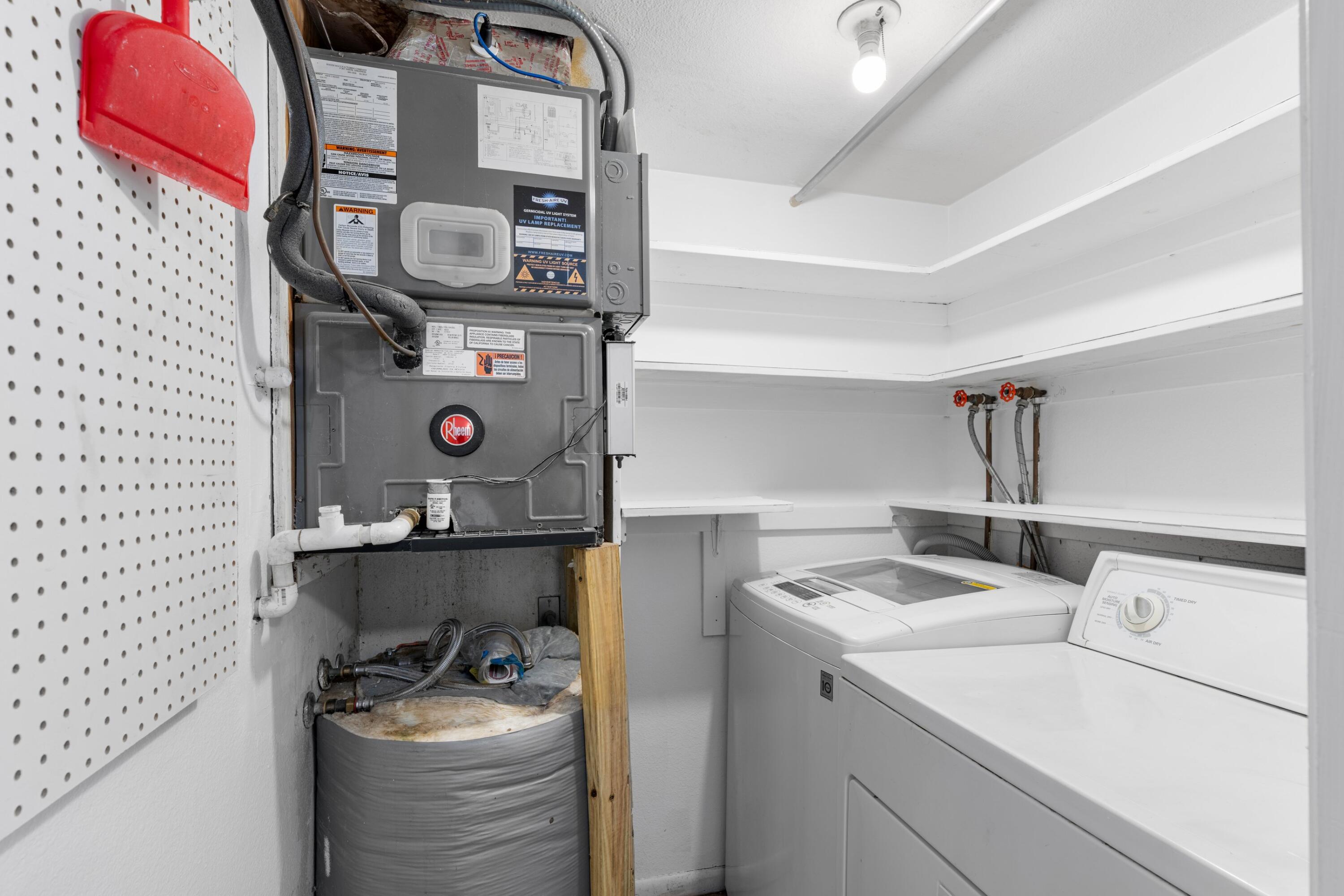10693 North Military Trail, Unit 7 Palm Beach Gardens, FL 33410 - Photo 21 of 28 a utility room with dryer and washer