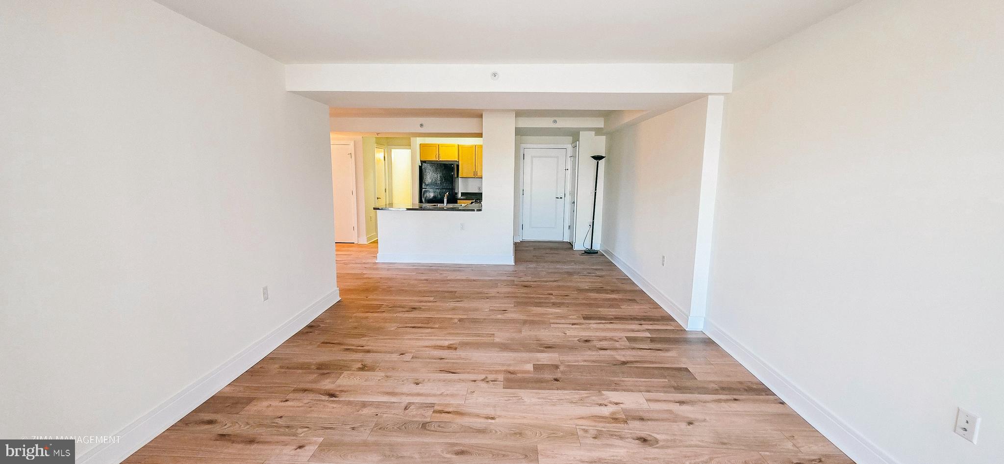 800 4th Street Southwest, Unit S402 Washington, DC 20024 - Photo 9 of 17 a view of a hallway with wooden floor