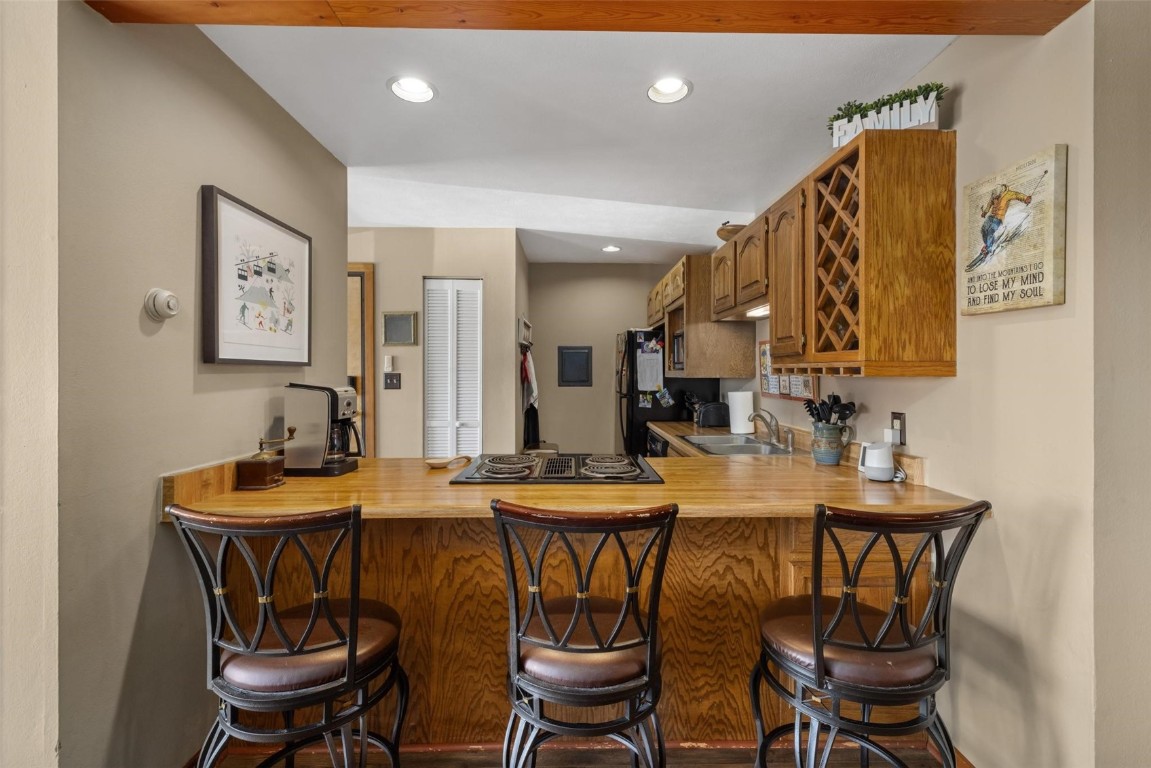 91200 Ryan Gulch Road, Unit 91204 Wildernest, CO 80498 - Photo 10 of 21 a view of a dining room with furniture and a table