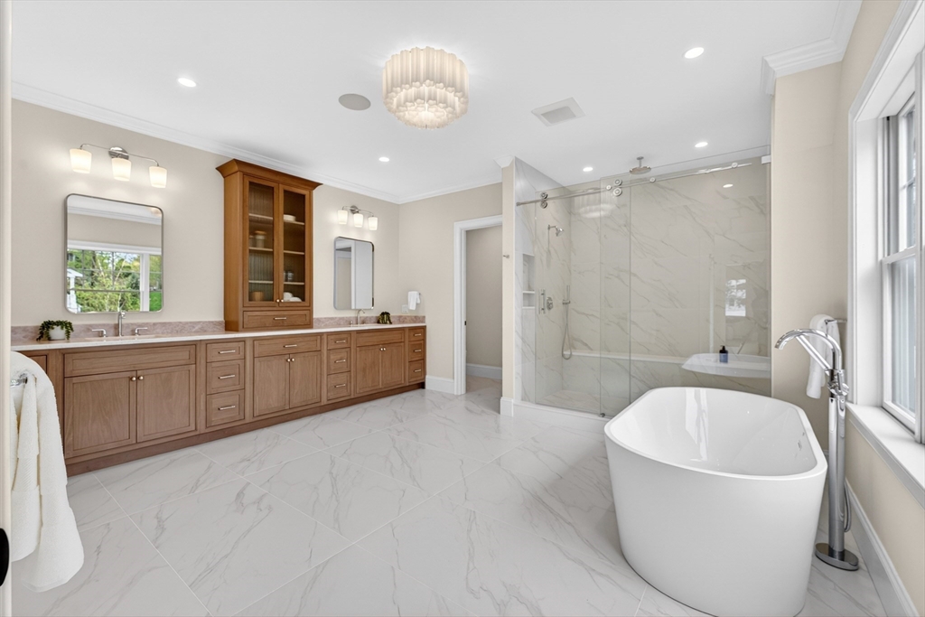 8 Crestview Road Needham, MA 02492 - Photo 17 of 30 a spacious bathroom with a tub sink and mirror