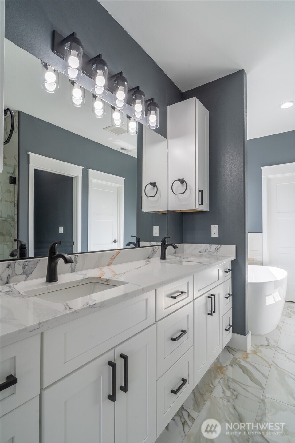 201 Bridgeview Drive Vantage, WA 98950 - Photo 14 of 40 a bathroom with a granite countertop sink a large mirror and vanity