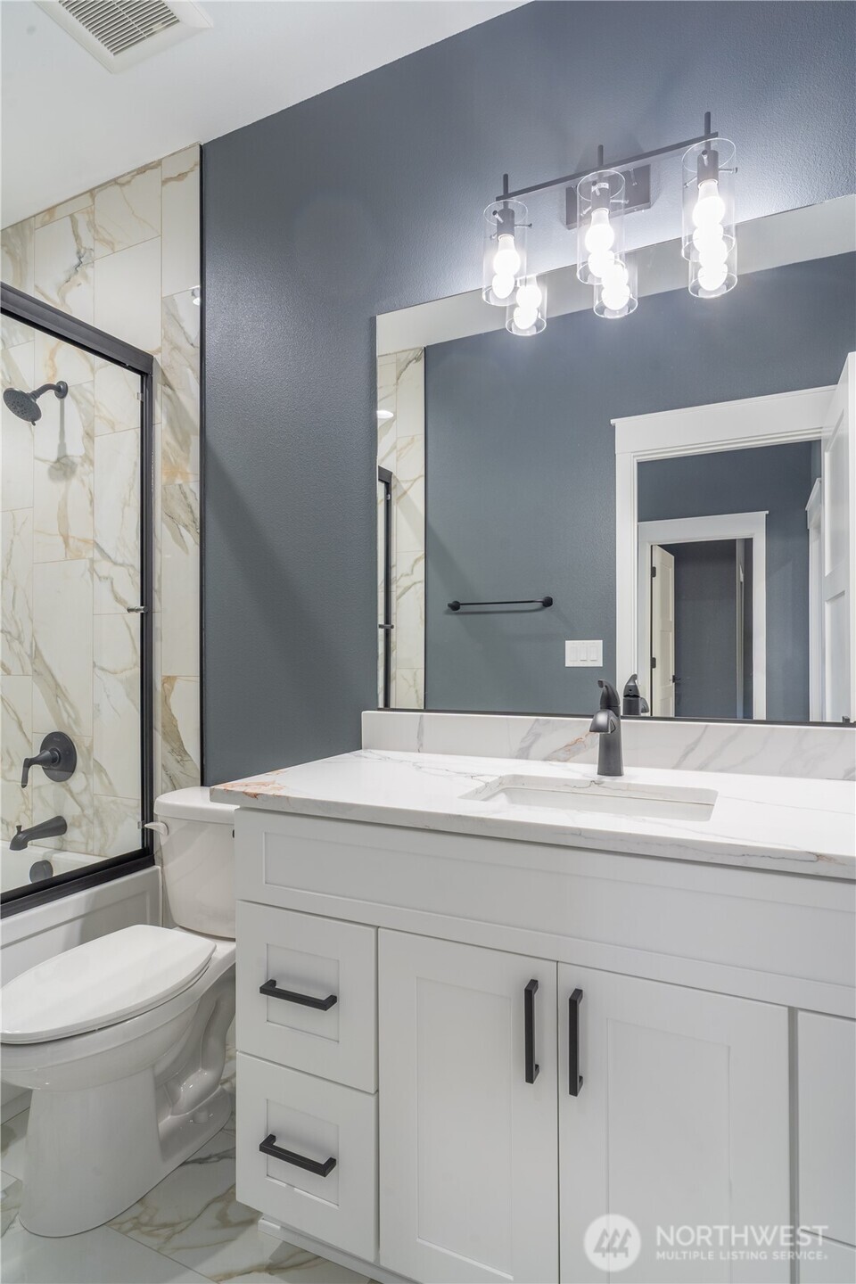 201 Bridgeview Drive Vantage, WA 98950 - Photo 28 of 40 a bathroom with a sink a toilet a mirror and shower