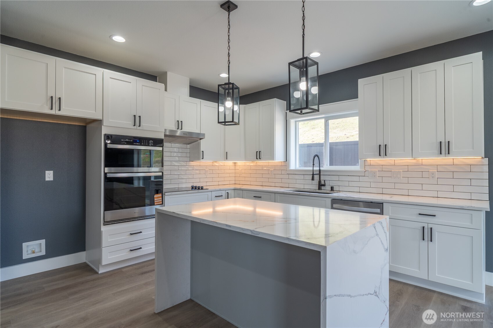 201 Bridgeview Drive Vantage, WA 98950 - Photo 6 of 40 a kitchen with stainless steel appliances granite countertop a sink a stove and a refrigerator
