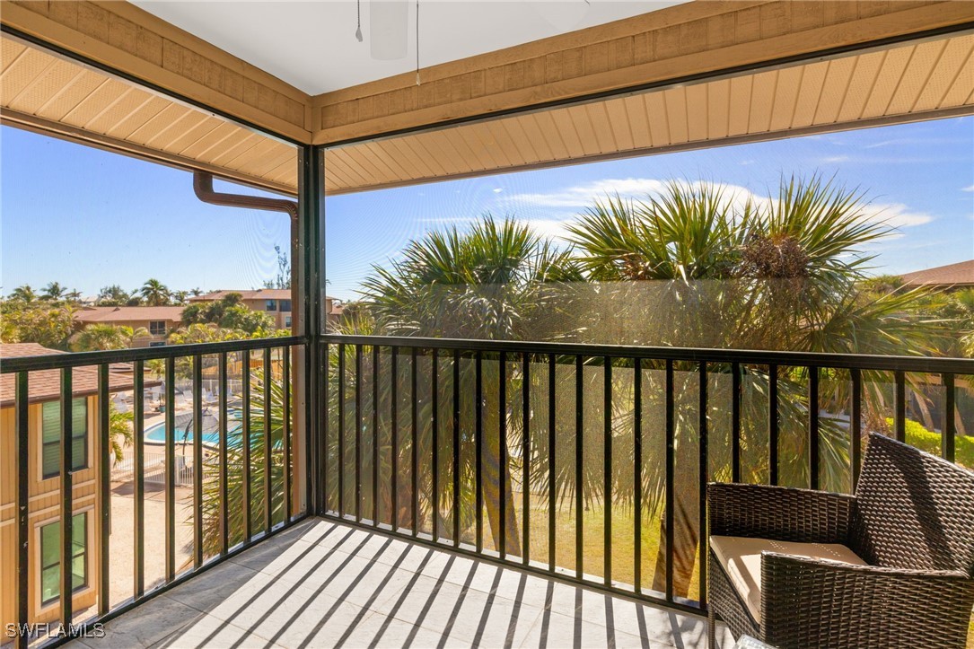 5117 Sea Bell Road, Unit C207 Sanibel, FL 33957 - Photo 20 of 43 a view of balcony with furniture