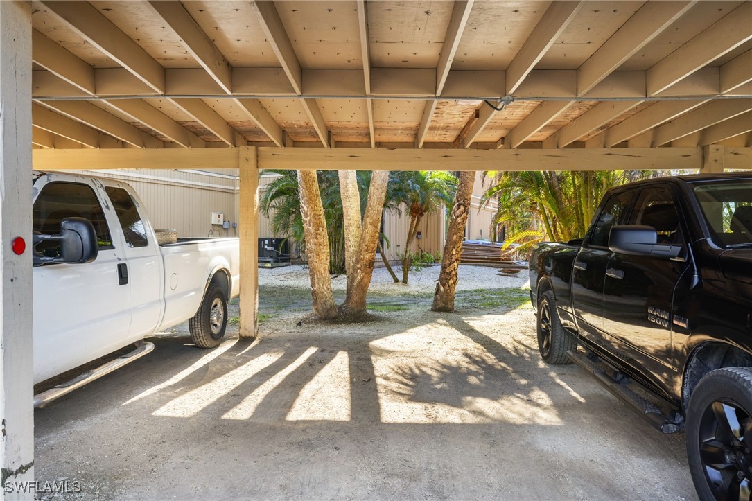5117 Sea Bell Road, Unit C207 Sanibel, FL 33957 - Photo 25 of 43 a view of car garage